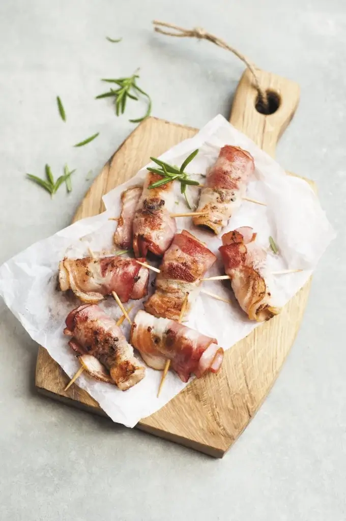 Meat served on a chopping board